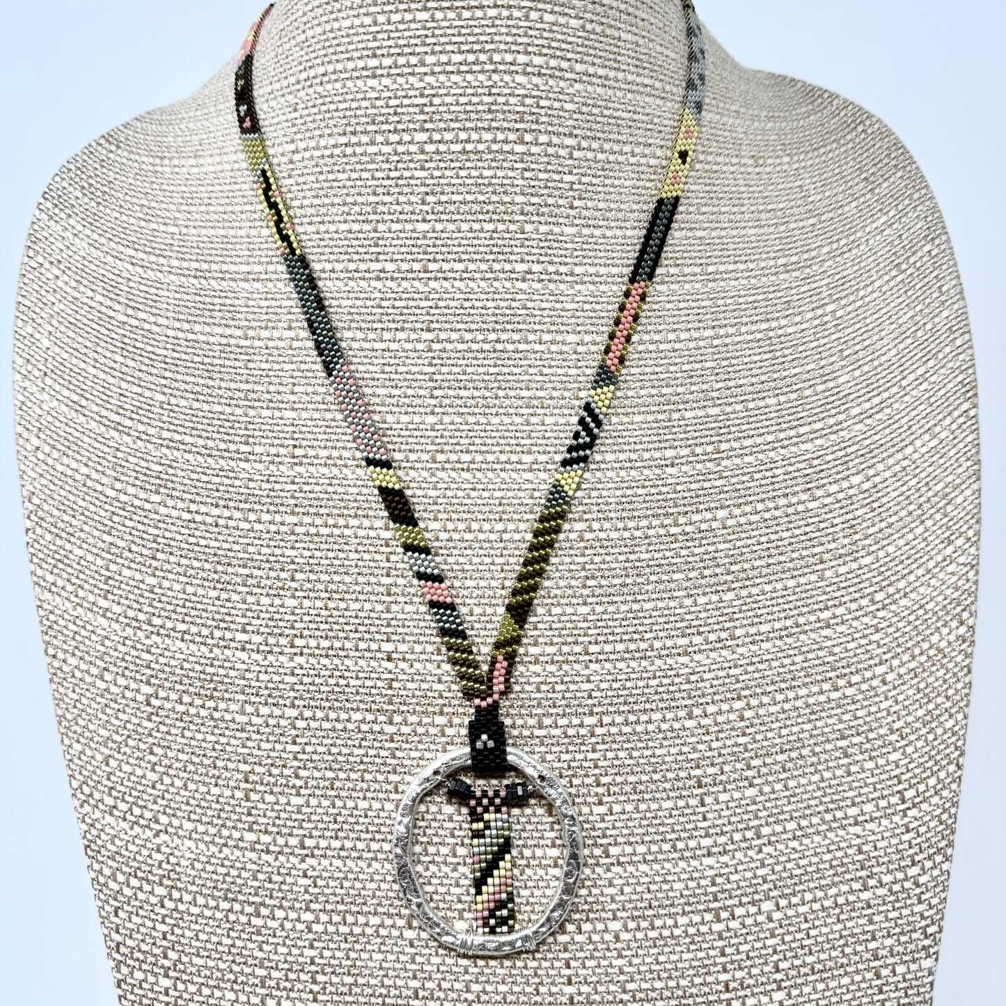 Patterned Necklace with Fine Silver Ellipse